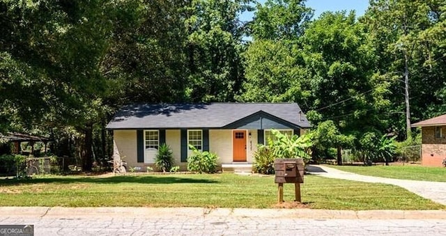 view of front of property with a front lawn