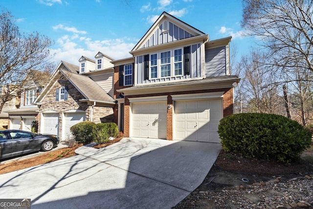 view of front of home featuring an attached garage, brick siding, board and batten siding, and driveway