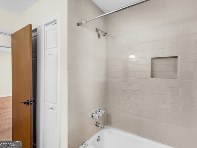 bathroom featuring shower / tub combination