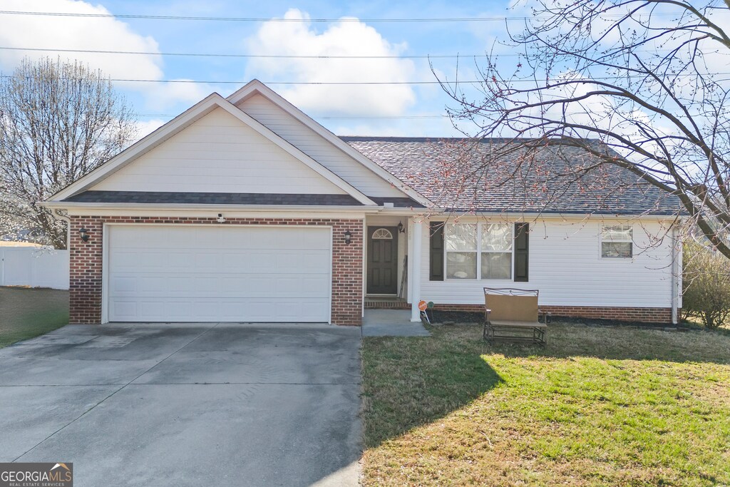 108 Glen Arbor Dr, Anderson, SC 29625 - ranch-style home with brick siding, an attached garage, concrete driveway, and a front yard