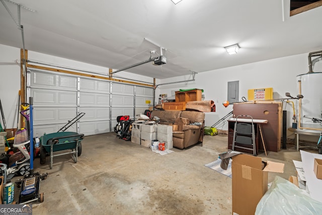 garage with gas water heater, electric panel, and a garage door opener