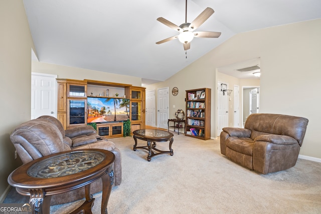 living room with visible vents, a ceiling fan, carpet floors, baseboards, and vaulted ceiling