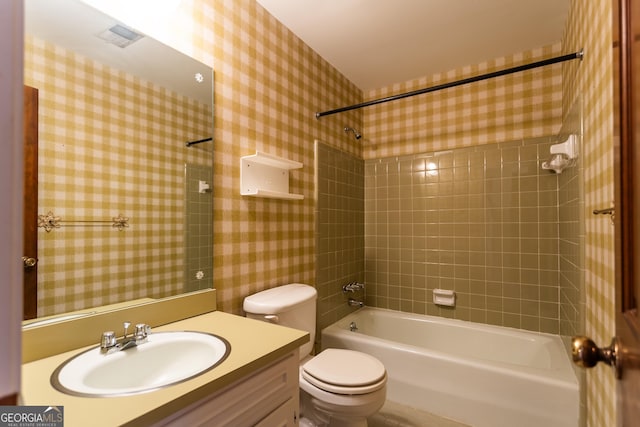 full bathroom with toilet, vanity, wallpapered walls, and shower / bath combination