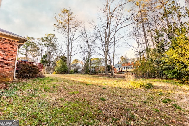 view of yard with a deck