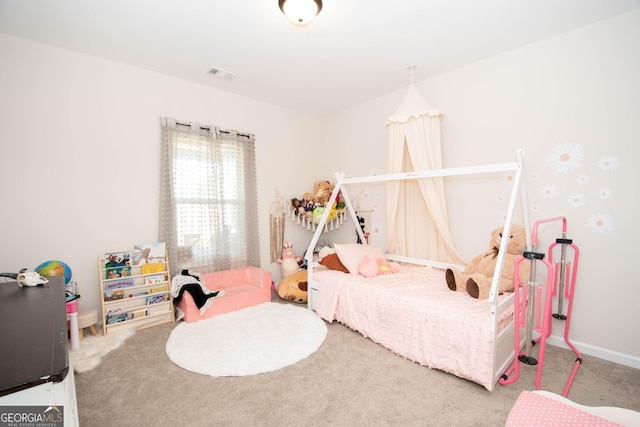 carpeted bedroom with visible vents