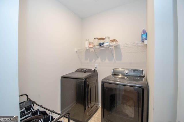 clothes washing area with laundry area and independent washer and dryer