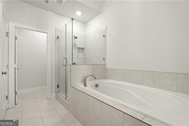 bathroom with a shower stall, a garden tub, visible vents, and tile patterned floors