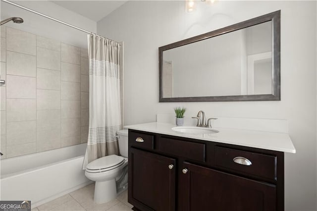 full bath featuring tile patterned floors, toilet, shower / tub combo with curtain, and vanity