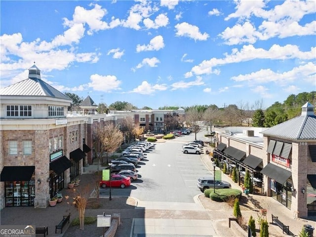 view of street featuring curbs and sidewalks