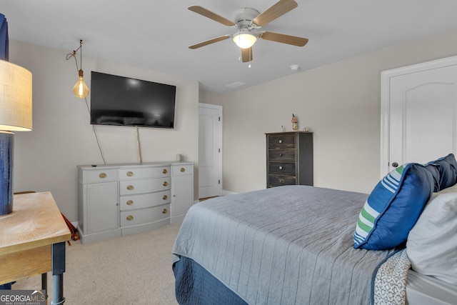 carpeted bedroom featuring a ceiling fan