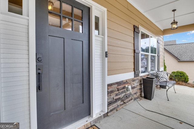 entrance to property with a porch