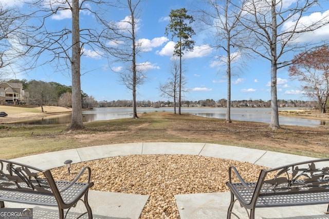 view of patio / terrace featuring a water view