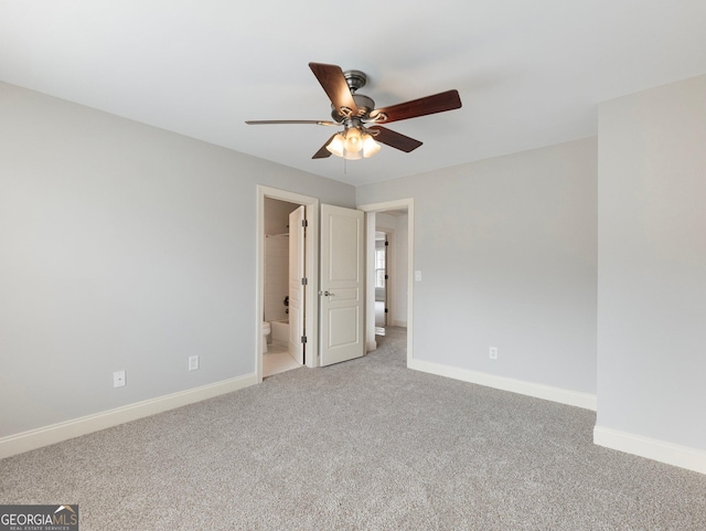 unfurnished bedroom featuring baseboards, light colored carpet, and ceiling fan