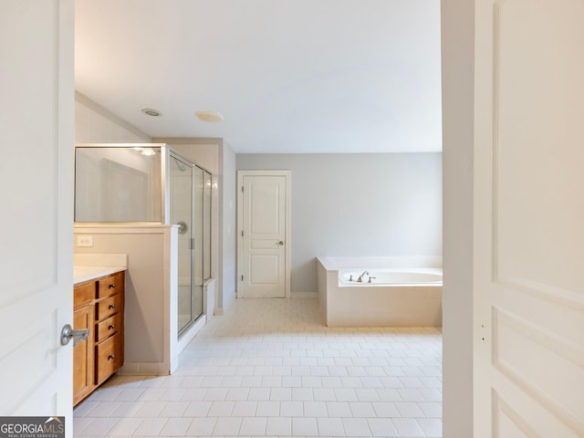 full bath featuring vanity, tile patterned flooring, a shower stall, baseboards, and a bath