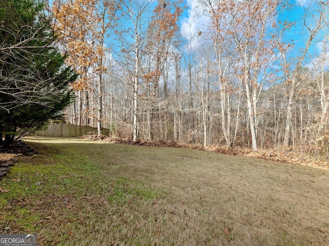 view of yard featuring fence