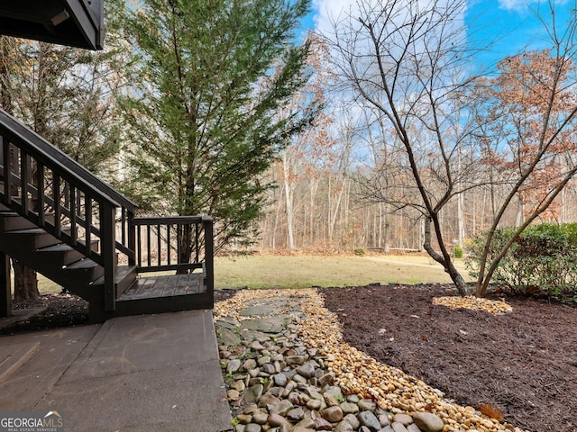 view of yard featuring stairway