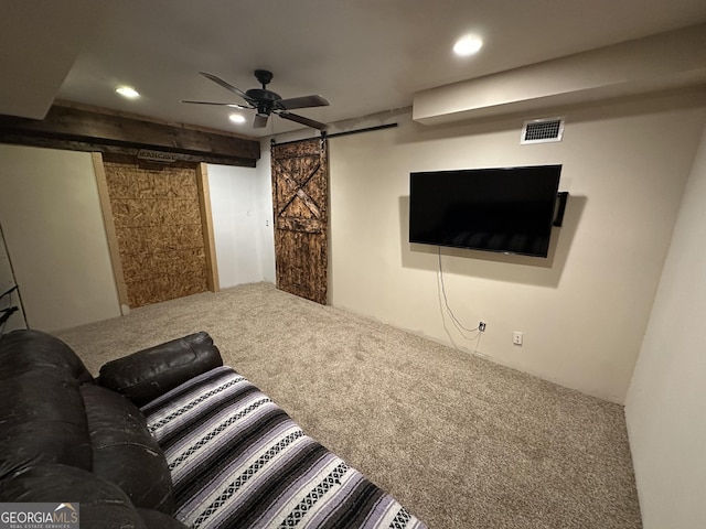 carpeted living area featuring recessed lighting, a barn door, visible vents, and a ceiling fan