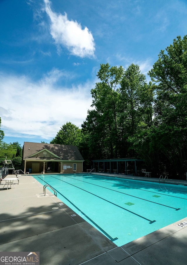 pool featuring a patio