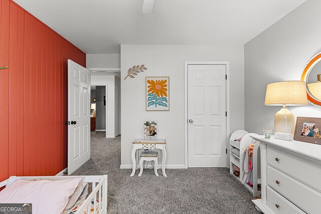 bedroom with baseboards, ceiling fan, and carpet flooring