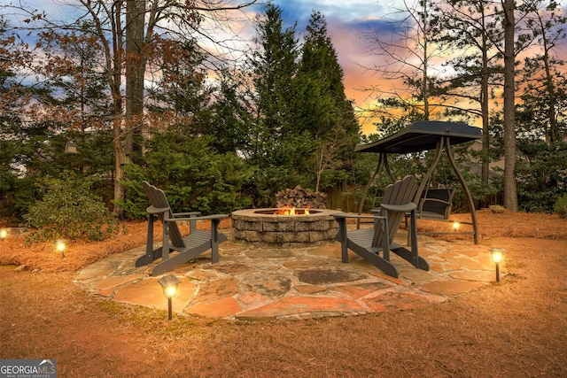 view of patio featuring a fire pit