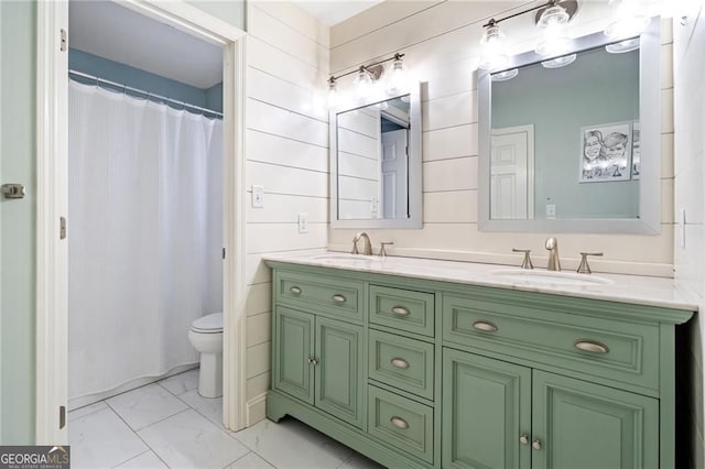 217 Colonial Dr, Woodstock, GA 30189 - bathroom featuring toilet, marble look tiles, and double vanity