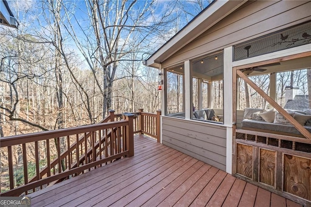 217 Colonial Dr, Woodstock, GA 30189 - wooden deck featuring a sunroom and stairs