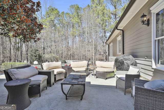 view of patio / terrace featuring a grill and an outdoor hangout area