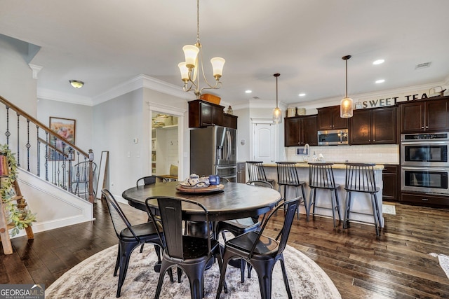 dining space with visible vents, dark wood-style flooring, stairs, and crown molding