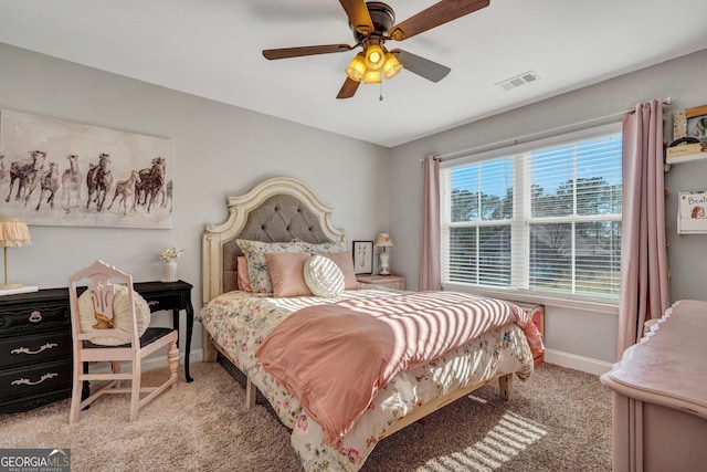 bedroom featuring visible vents, carpet flooring, a ceiling fan, and baseboards