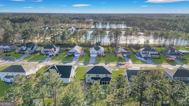 birds eye view of property with a residential view