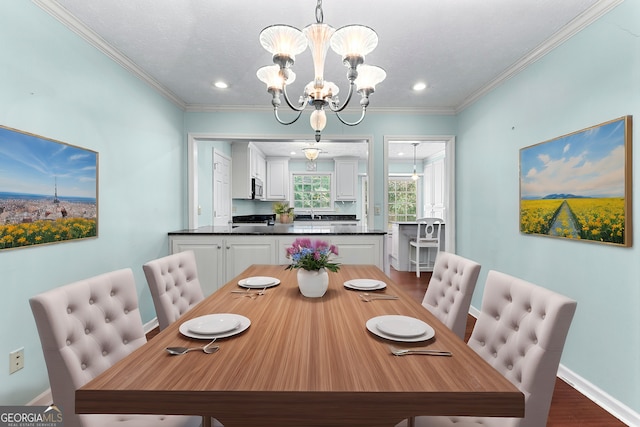 dining area with an inviting chandelier, dark wood-style floors, baseboards, and ornamental molding