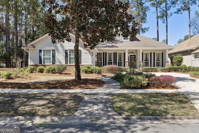 view of front of property featuring brick siding