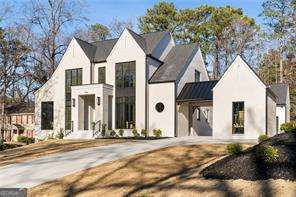 view of front of home with a standing seam roof and metal roof