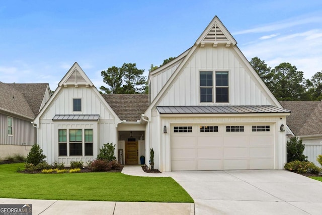 modern farmhouse style home with a standing seam roof, concrete driveway, board and batten siding, and a shingled roof