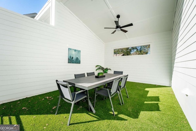 view of patio featuring outdoor dining area and ceiling fan