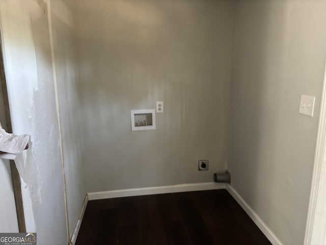 clothes washing area featuring baseboards, dark wood finished floors, laundry area, electric dryer hookup, and washer hookup