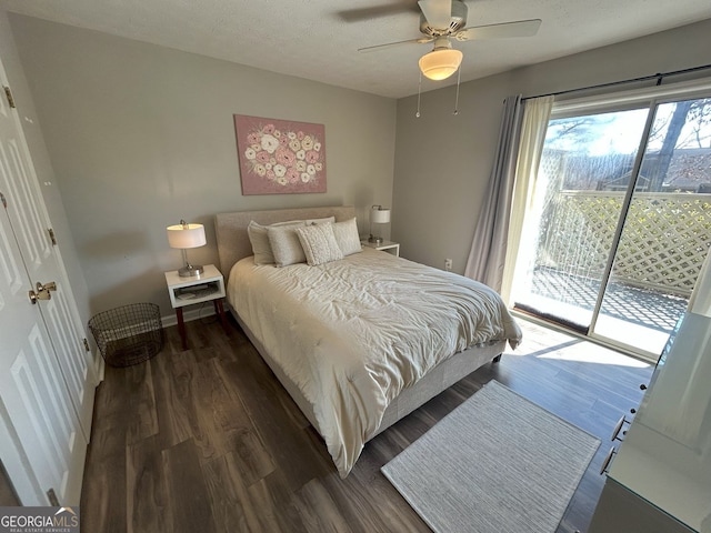 bedroom featuring baseboards, ceiling fan, access to exterior, dark wood-type flooring, and a textured ceiling