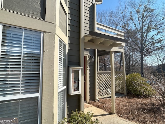 property entrance with brick siding