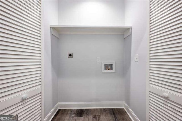 laundry area with hookup for a washing machine, dark wood-style floors, baseboards, and electric dryer hookup