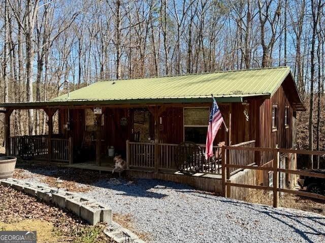 view of front of home featuring metal roof