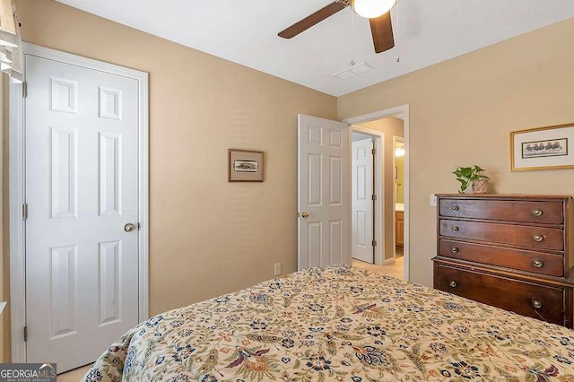 bedroom with ceiling fan and visible vents