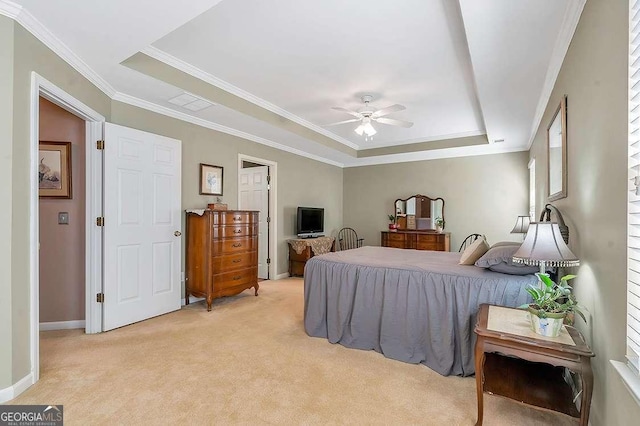 bedroom featuring light carpet, baseboards, ceiling fan, crown molding, and a raised ceiling