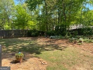 view of yard featuring fence