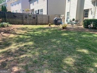 view of yard with fence