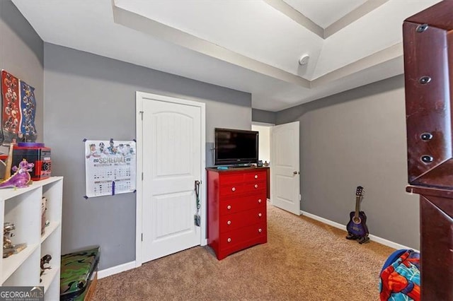 game room with a raised ceiling, baseboards, and carpet floors