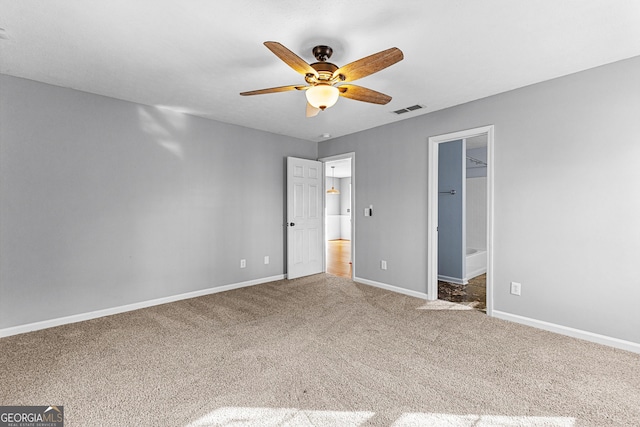 unfurnished bedroom with visible vents, carpet flooring, baseboards, and ceiling fan