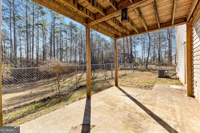 view of patio featuring cooling unit and a fenced backyard