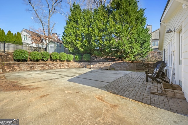 view of patio with fence