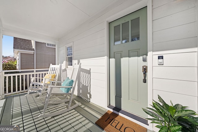 entrance to property with a porch