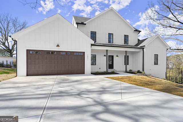 modern inspired farmhouse featuring driveway, a porch, board and batten siding, an attached garage, and a shingled roof